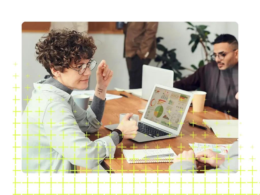 Image of people having a meeting around a table